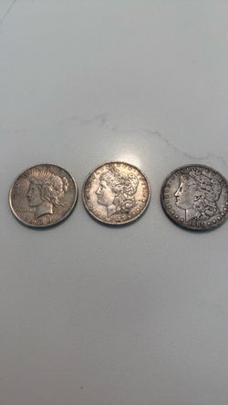 Three Silver Dollars.