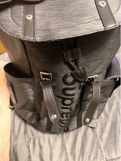 LV/Supreme backpack
