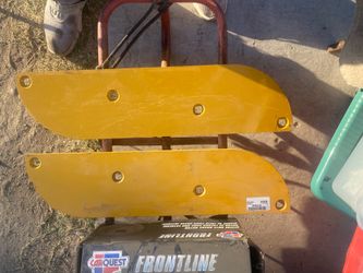 This is a John Deere CXT12048 reversible cutting edge, commonly used on box blades and loader buckets.
