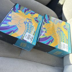 Pokemon Ascended Heros and Charizard Tin