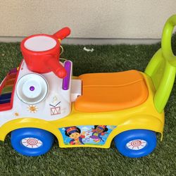 Fisher-Price Little People Music Parade Ride-On with Lights and Sounds for Ages 1-3