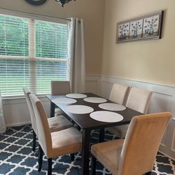 6 Chairs And A Table