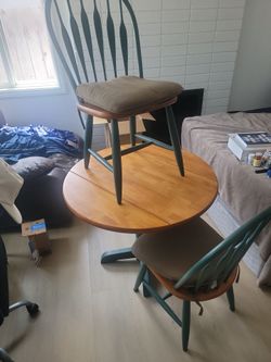 Dinette table and 2 chairs. Solid wood
