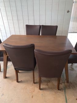 Last Time Last Chance to purchase Wooden And Leather Dining Table with 6 Brown Leather Chairs