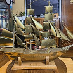 Solid Brass Boat. The dimensions are 19x15