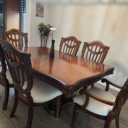 Classy Dining Table And Chairs