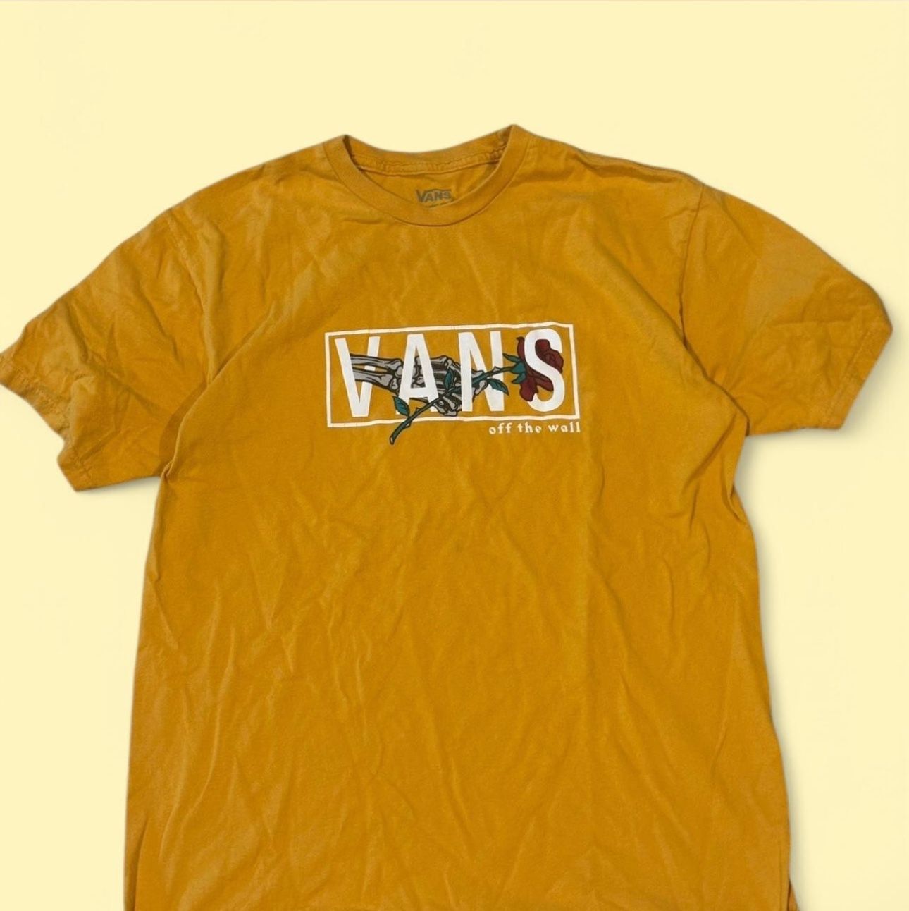 Orange Vans tee with a relaxed fit