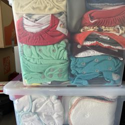 Cloth Diapers And Bin Of Liners