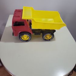 Vintage TOY 12" plastic Dump Truck 620 red/yellow Goodyear Tracker - has wear, rolls good - not sure of the actual production year or vehicle year