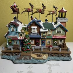 Christmas village pier Santa and reindeer