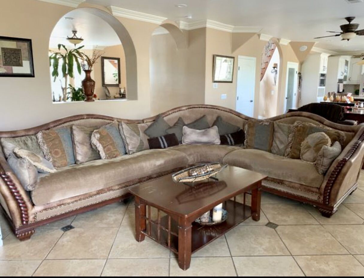Beige Sectional Couch and Table