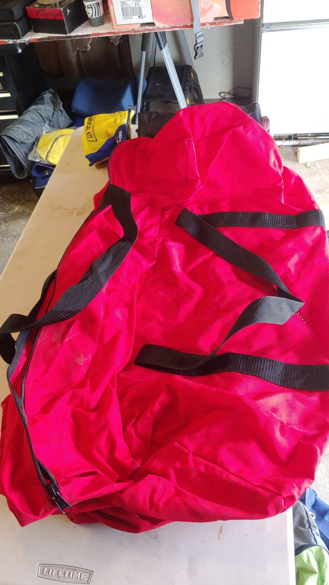 Red zip up duffle bag