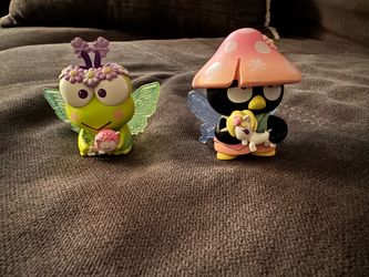 vinyl figures are part of the Tokidoki x Hello Kitty & Friends Butterfly Garden series.