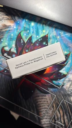 Foil-Sealed Secret Lair Drop: Transformers: Optimus Prime Vs. Megatron 