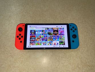 Nintendo Switch OLED Loaded with 125 Popular Switch Games