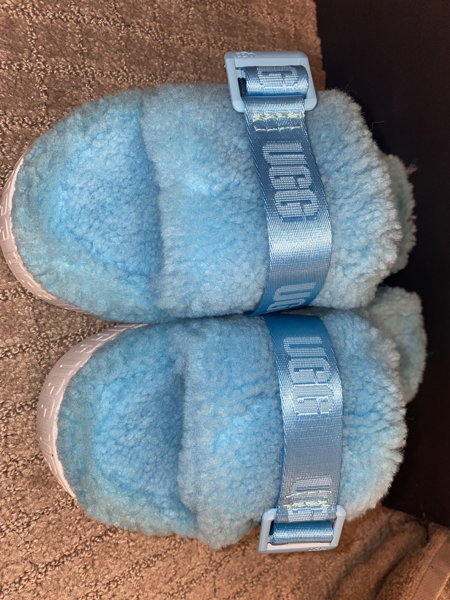 Blue UGG slides 