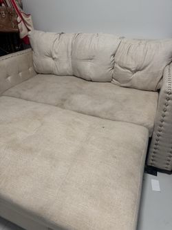 Love seat that turns into bed