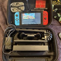 Nintendo switch bundle ,red and blue, w/ 3 games
