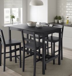 Bar height dining table