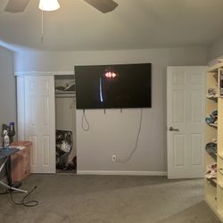 3 Smart TVs And A King Size Bed 