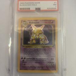 1999 POKEMON BASE SET UNLIMITED #1 ALAKAZAM-HOLO PSA 7