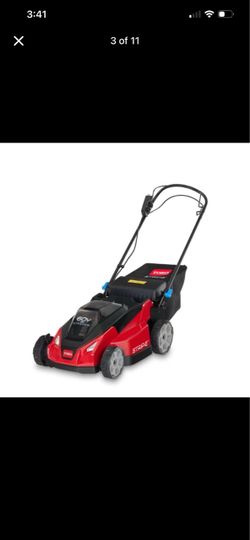 New in box self propelled Toto lawn mower with battery and charger