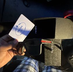 Prada sunglasses with authentication card