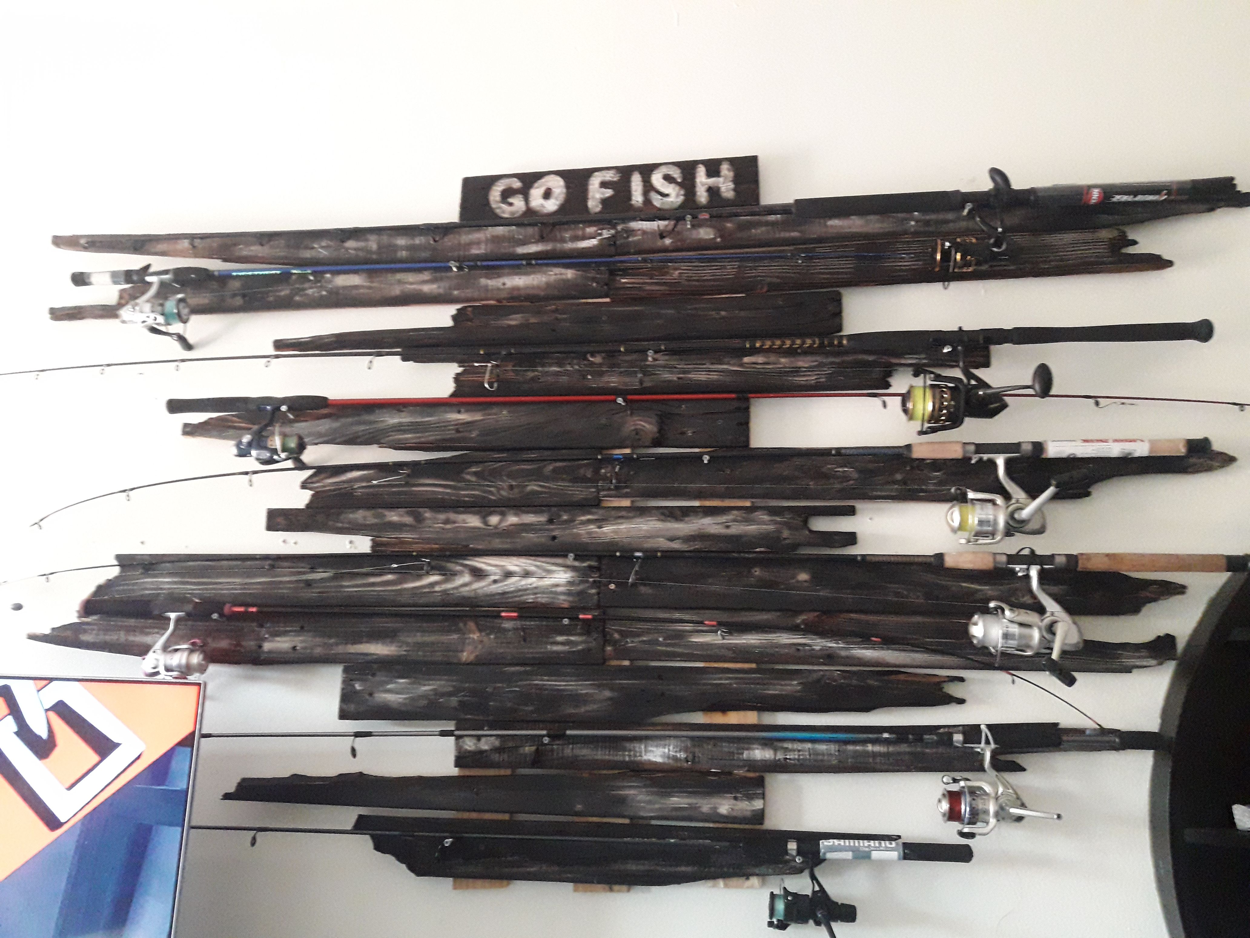 Wall Mounted Fishing Rod storage/holder wall decor for Sale in