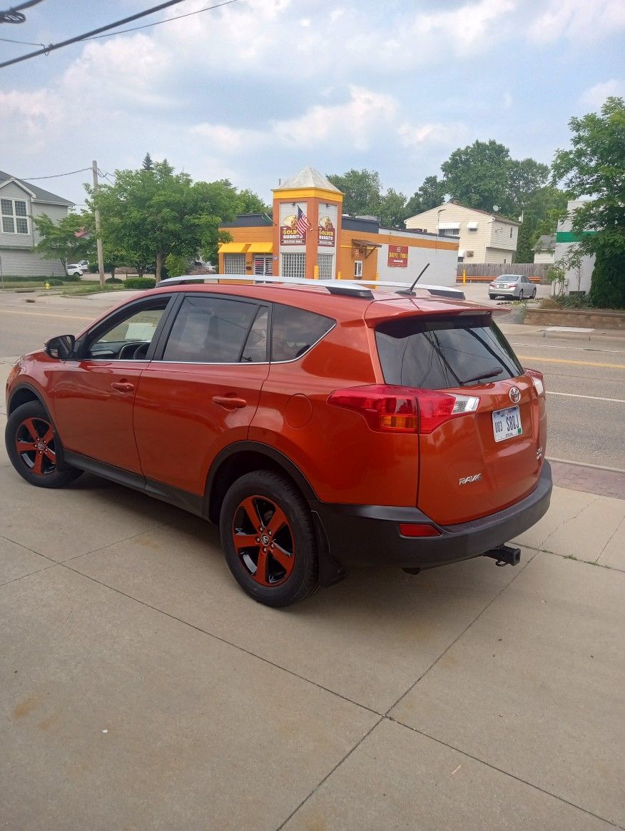 2015 Toyota RAV4 Totally Refurbished Painted The Rims The Same Color As The Car To Give It One Of A Kind Look Drives Wonderful