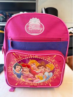 Disney princess mini backpack features a vibrant pink and purple design with graphics of popular princesses on the front pocket