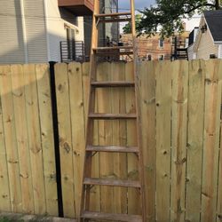 8 ’ wood ladder.