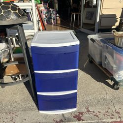 3-drawer plastic storage unit with a white frame and blue drawers