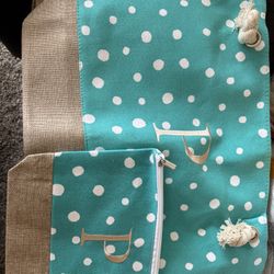 New with tags Yoolife tote bag with small cosmetic bag included with the initial (P)