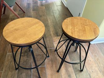 Two adjustable bar stools