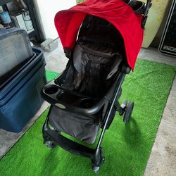 Graco red and black stroller