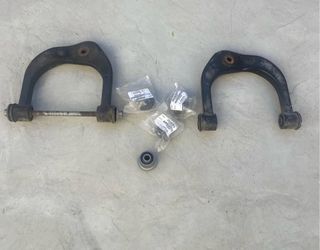 Tacoma  4 x 4 Upper Control Arm , and bushings Set –OEM