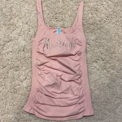 Guess Marciano pink silver medium microfiber spandex worn once. No piling 