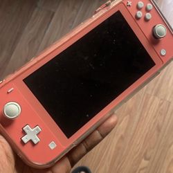 Nintendo Switch Lite With Clear Case and games already on it