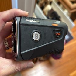 A Bushnell Tour V6 Range Finder. Golf Clubs 