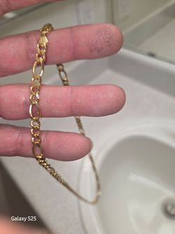 10k 22inch figaro chain 24.5 grams