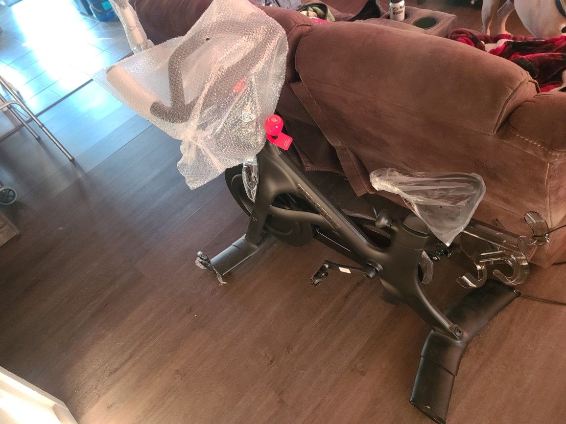 Brand New Peloton Exercise Bike+ and Accessories