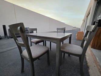 Dining table and 4 chairs