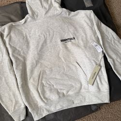 fear of god essentials light oatmeal size M