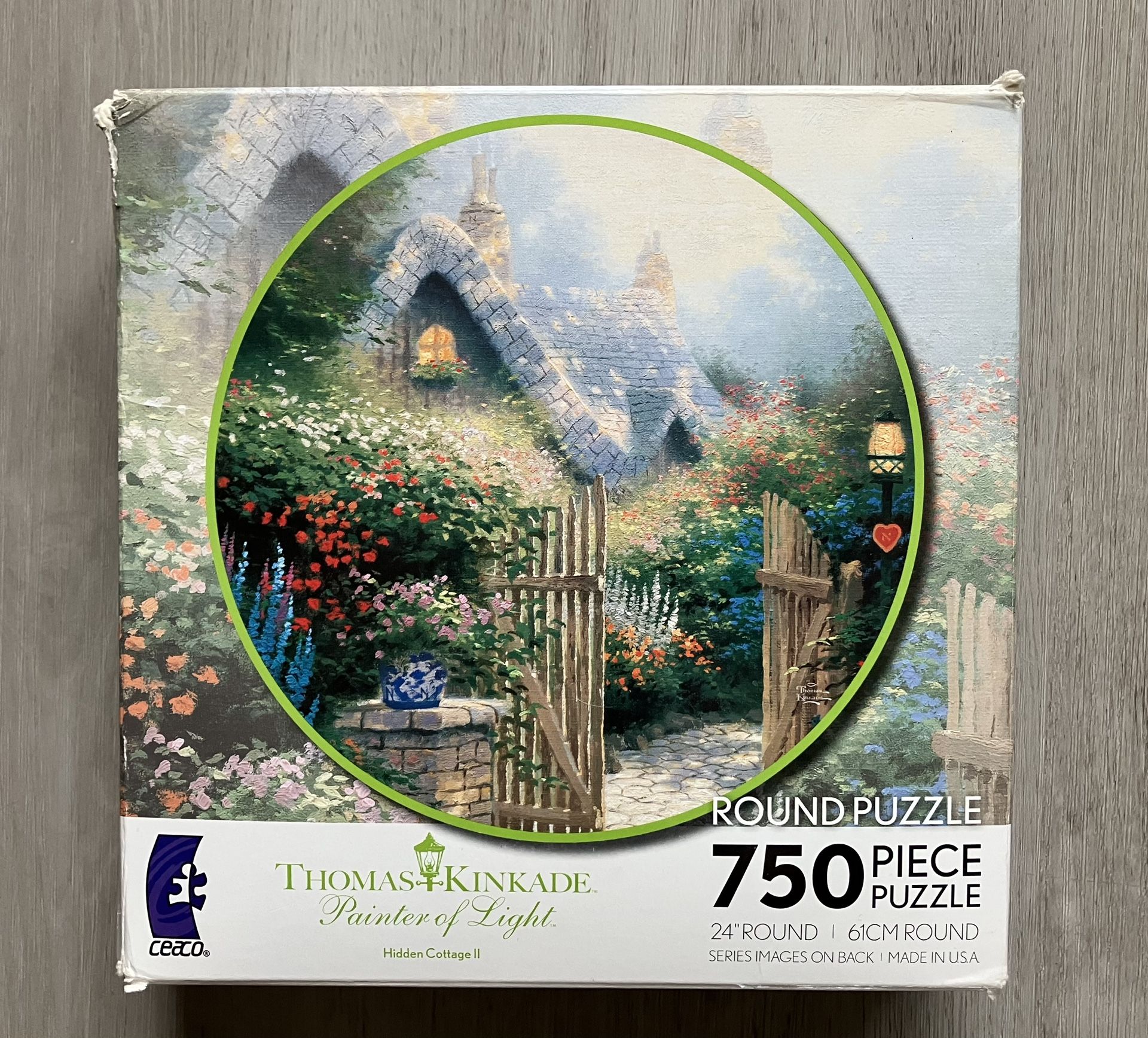 Thomas Kinkade 750 Piece Round Puzzle