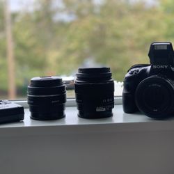 Sony A65 DSLR Camera w/ Kit Lens + 35mm  & 50mm f1.8 Prime Lenses