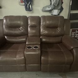 DOUBLE LEATHER ELECTRIC LOVESEAT  W/ SEPARATE RECLINER ROCKER