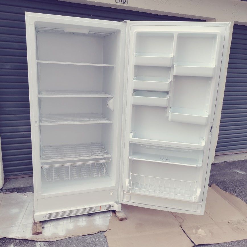 like new Kenmore 24 cubic feet stand up freezer works perfect with the