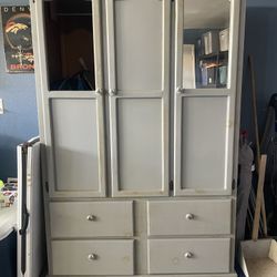 Armoire closet with drawers