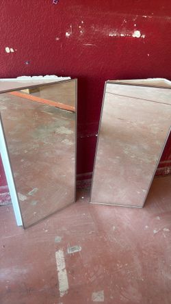 2 corner medicine cabinets with mirrors