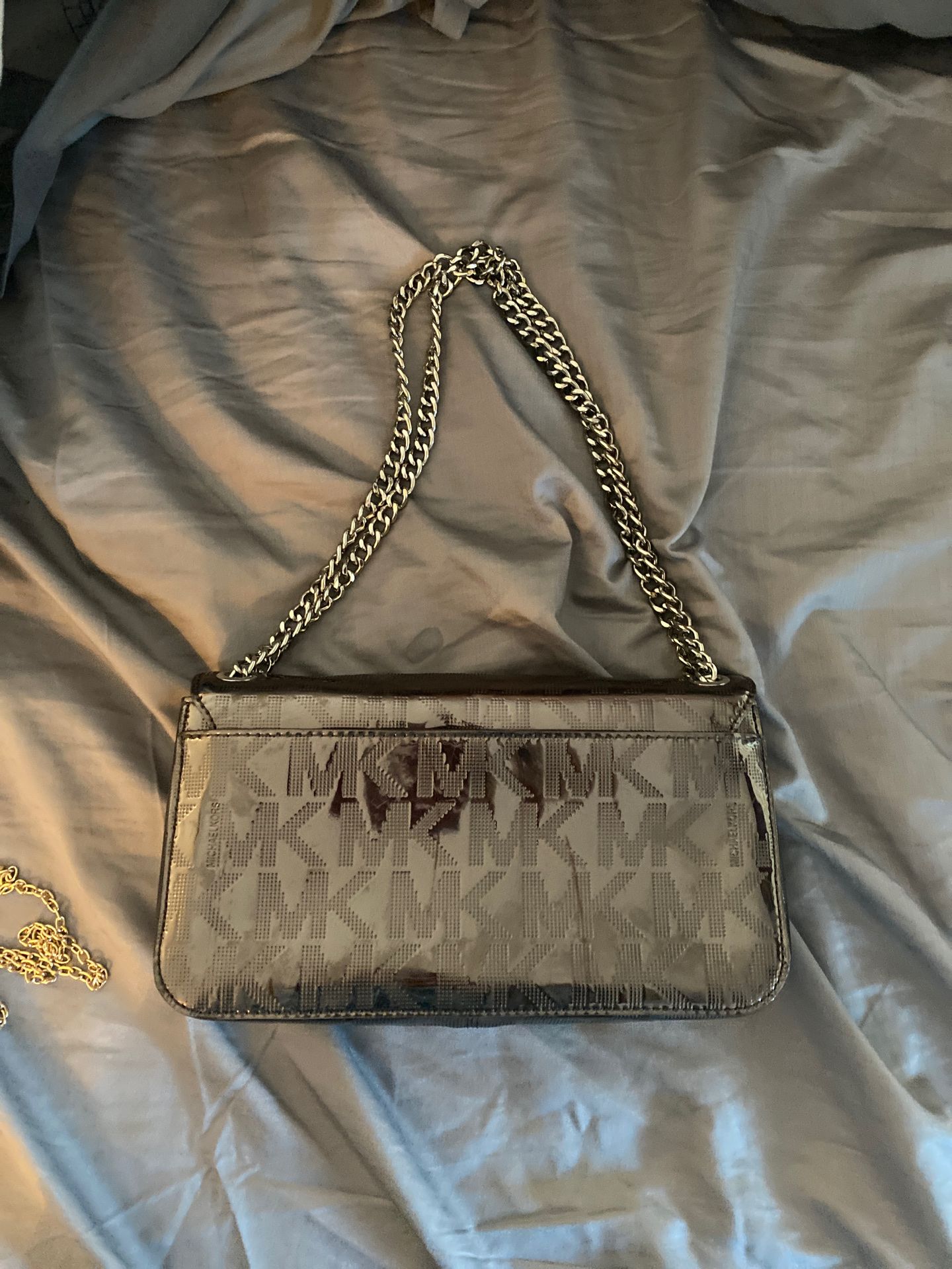 Beautiful Michael Kors silver handbag